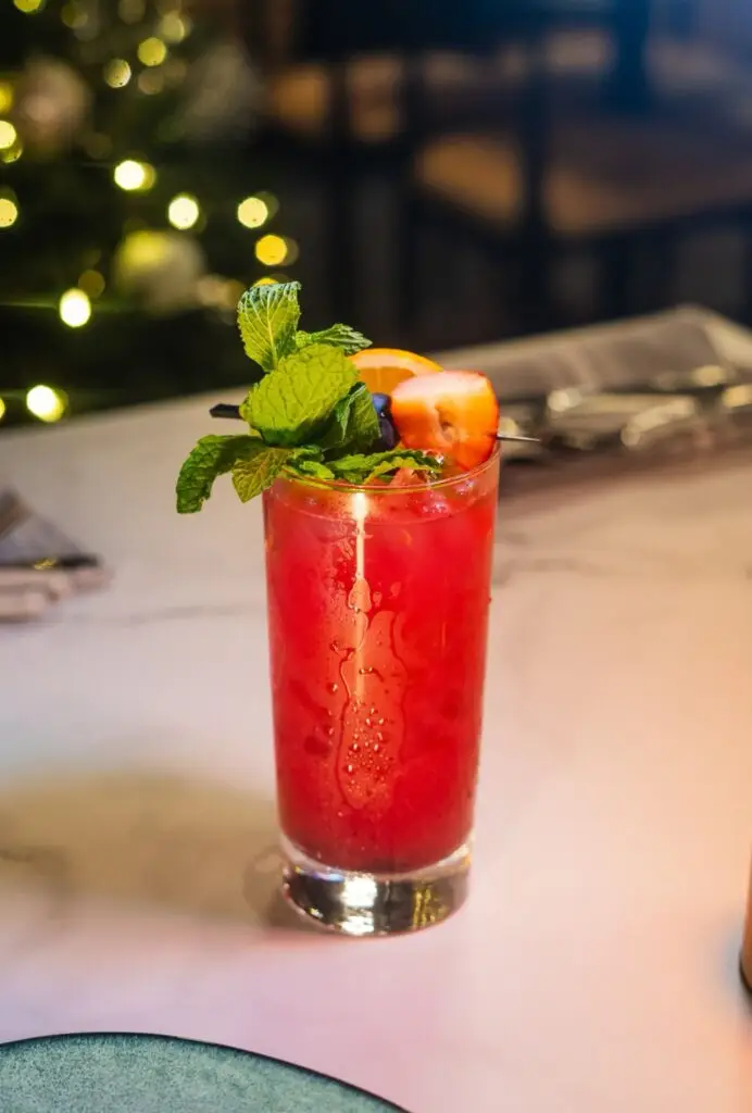 Strawberry Daiquiri with mint and orange on the top